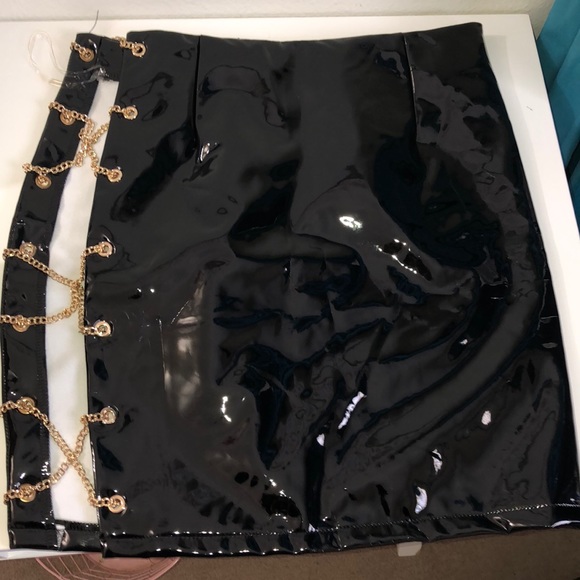 Dresses & Skirts - Black leather skirt with gold thigh chains